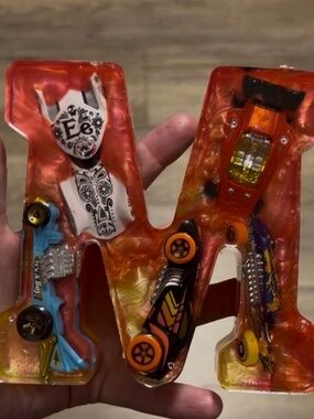 Hot wheels letter M